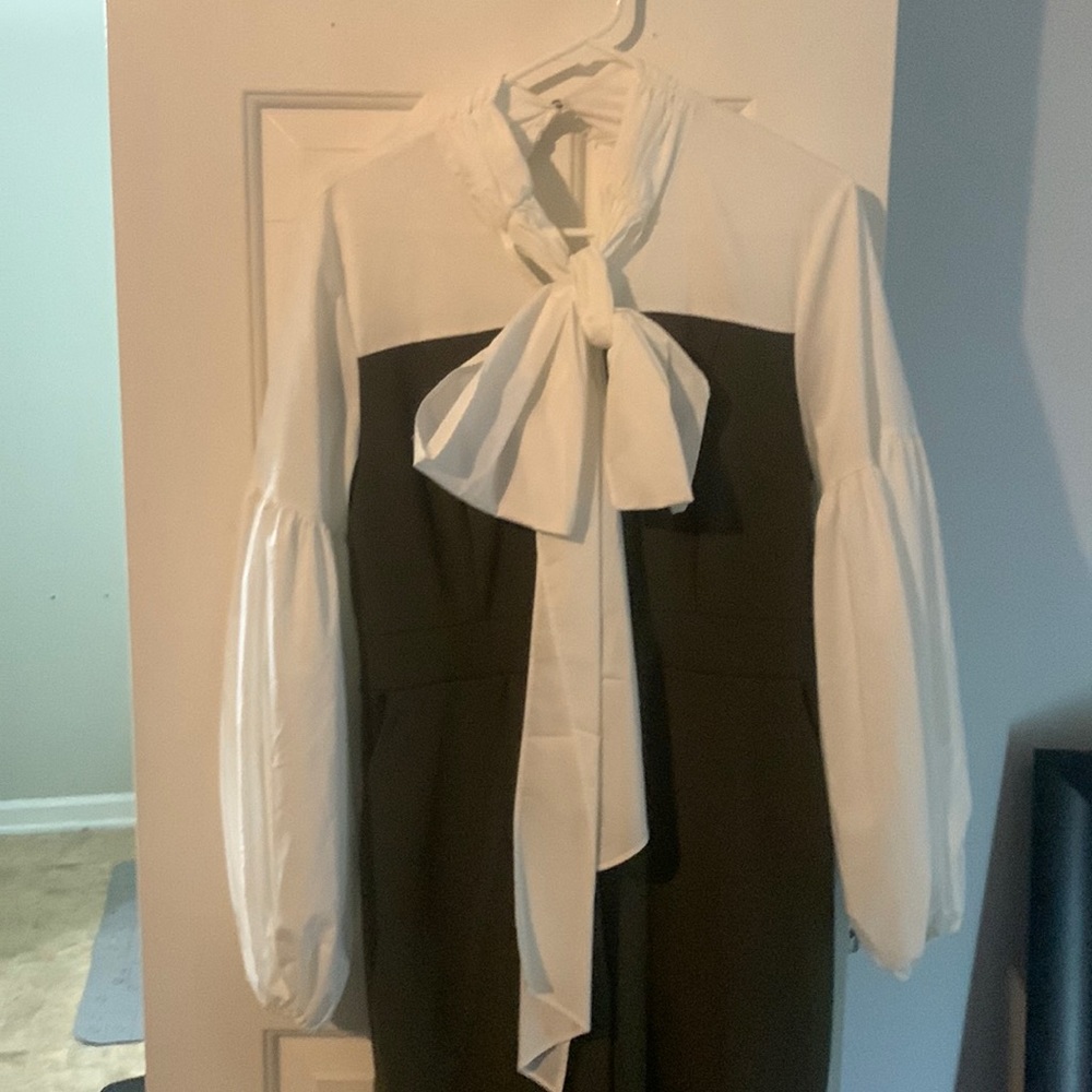 Size medium long sleeve jumper with bowtie in front